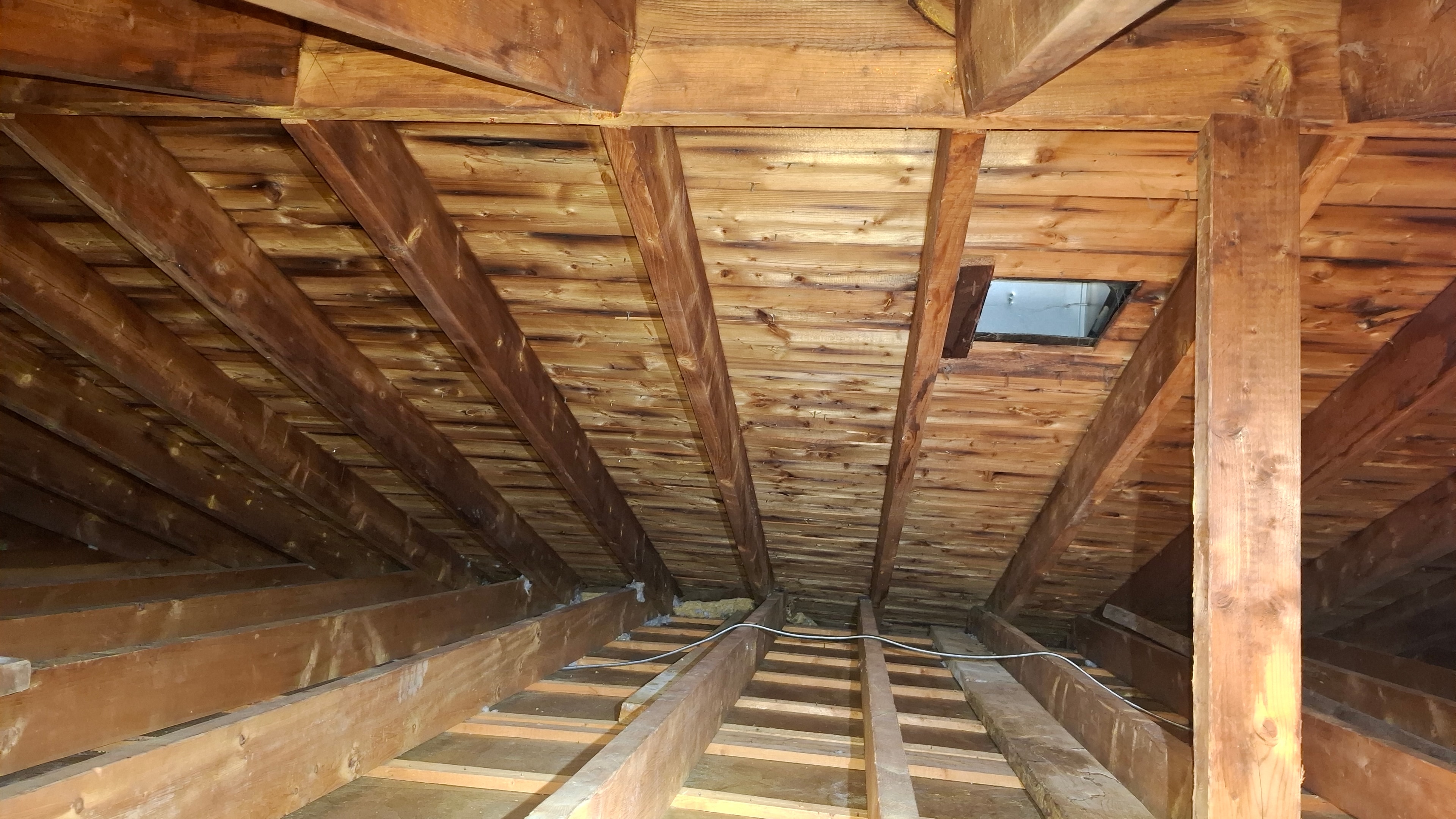 Clean attic roof structure after vermiculite removal and HEPA cleaning — Ottawa