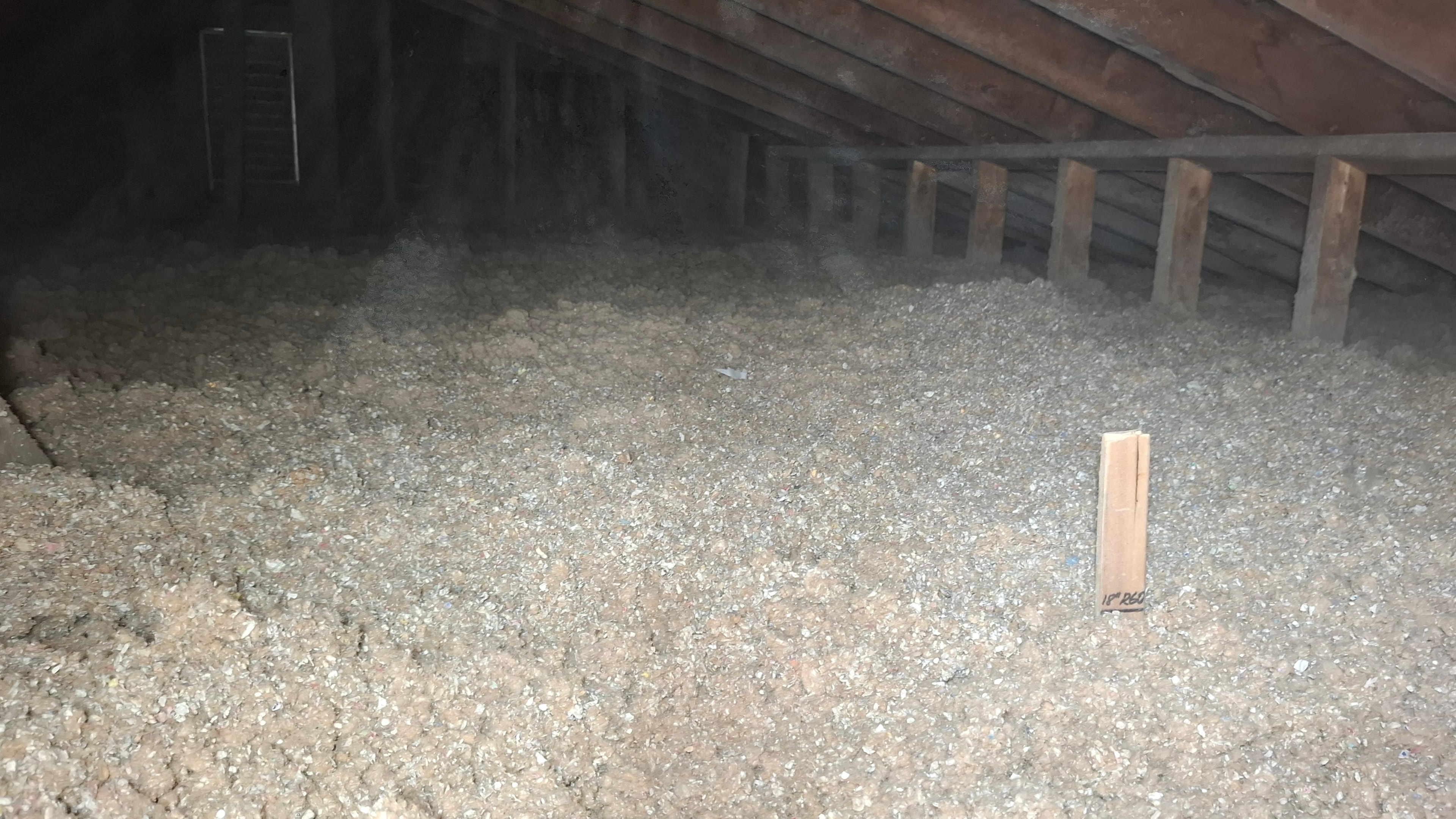 Completed R-60 blown cellulose insulation installed in Ottawa attic after vermiculite asbestos removal