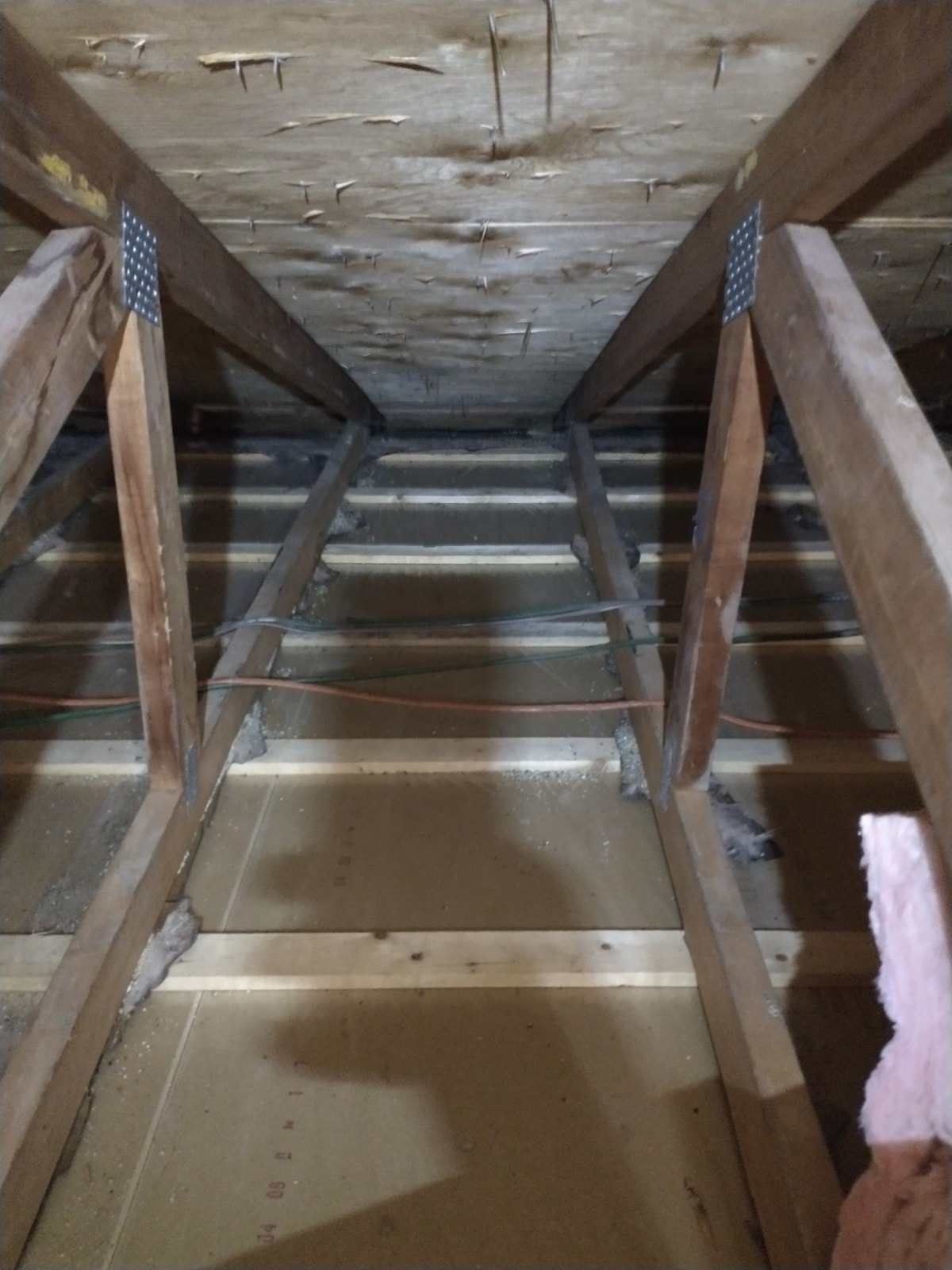 Attic framing fully cleared after Type 3 vermiculite abatement